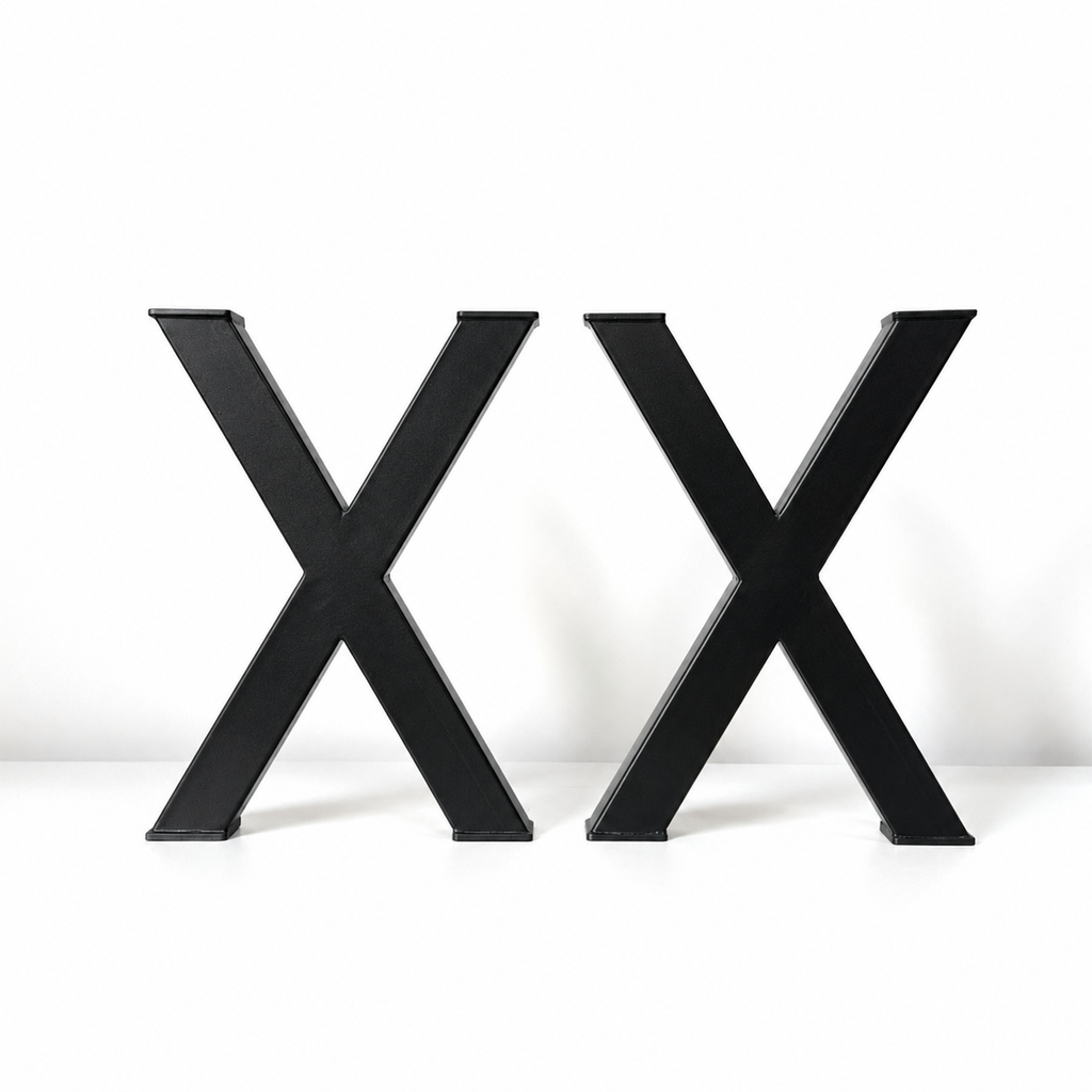 Two large black 3D letters 'X' standing side by side on a white surface against a white background.